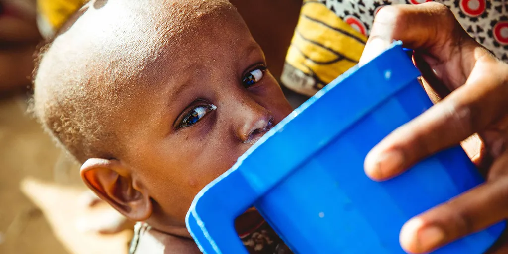 Facebook Food 03 Boy Drinking From Bucket