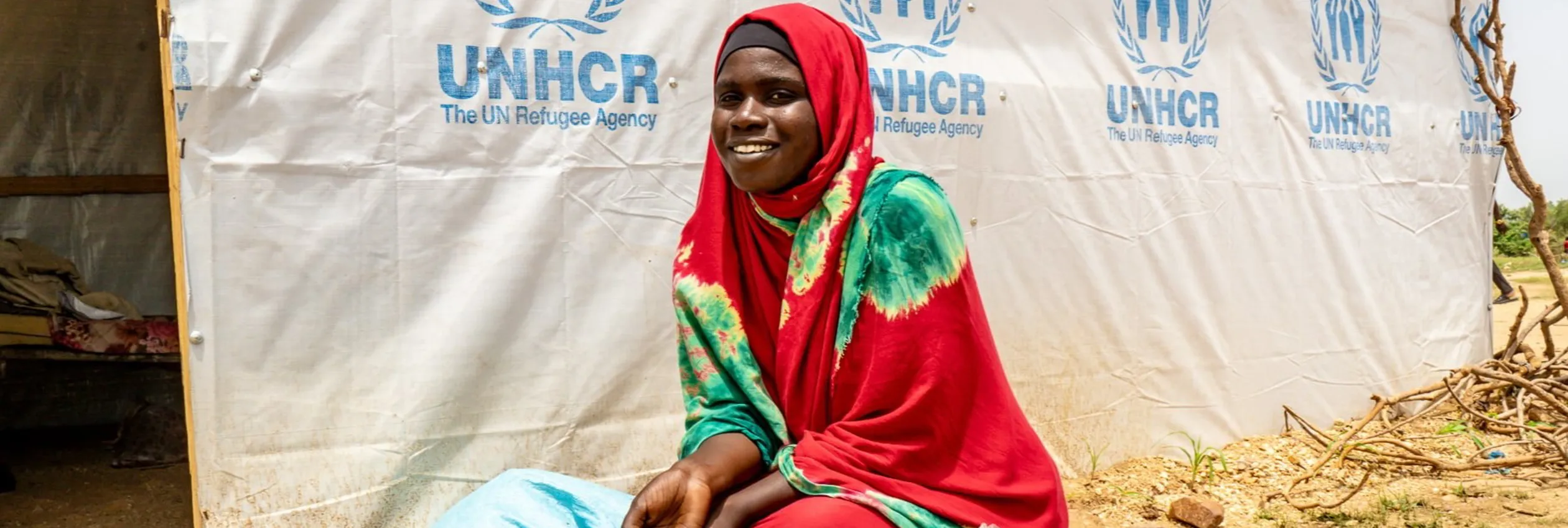 Chad_Hawa-Issat-In-Front-Of-Her-Temporary-Shelter-In-Metché-Camp