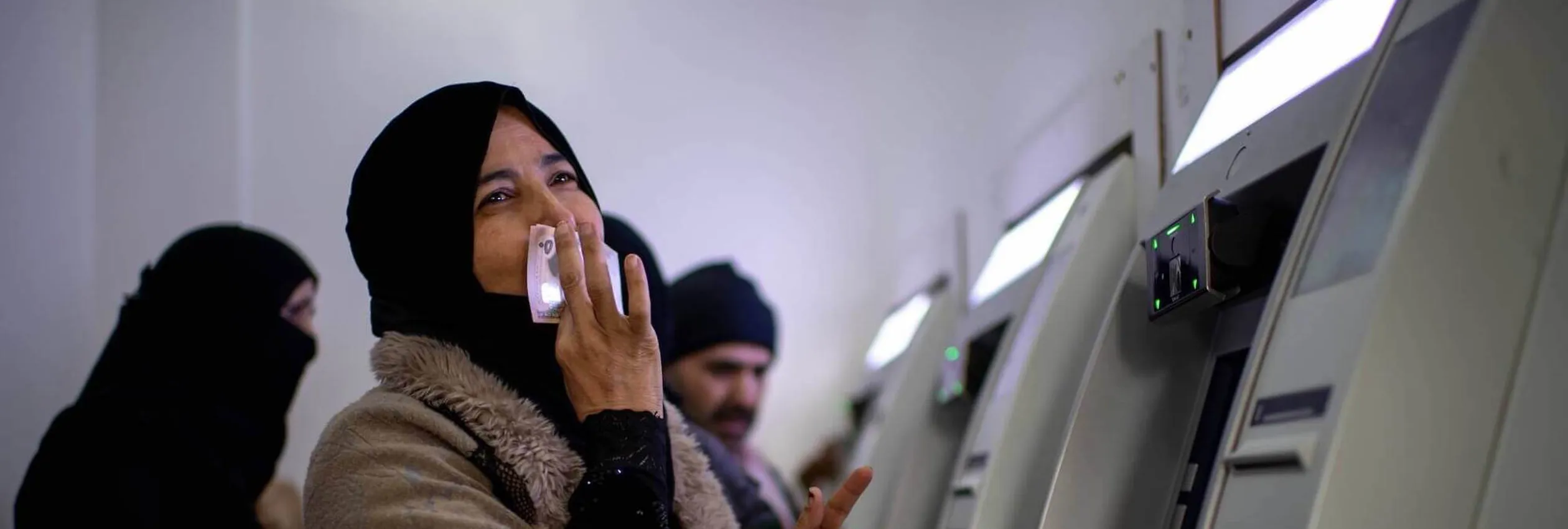 Banner Lwf Cash Assistance Woman Atm