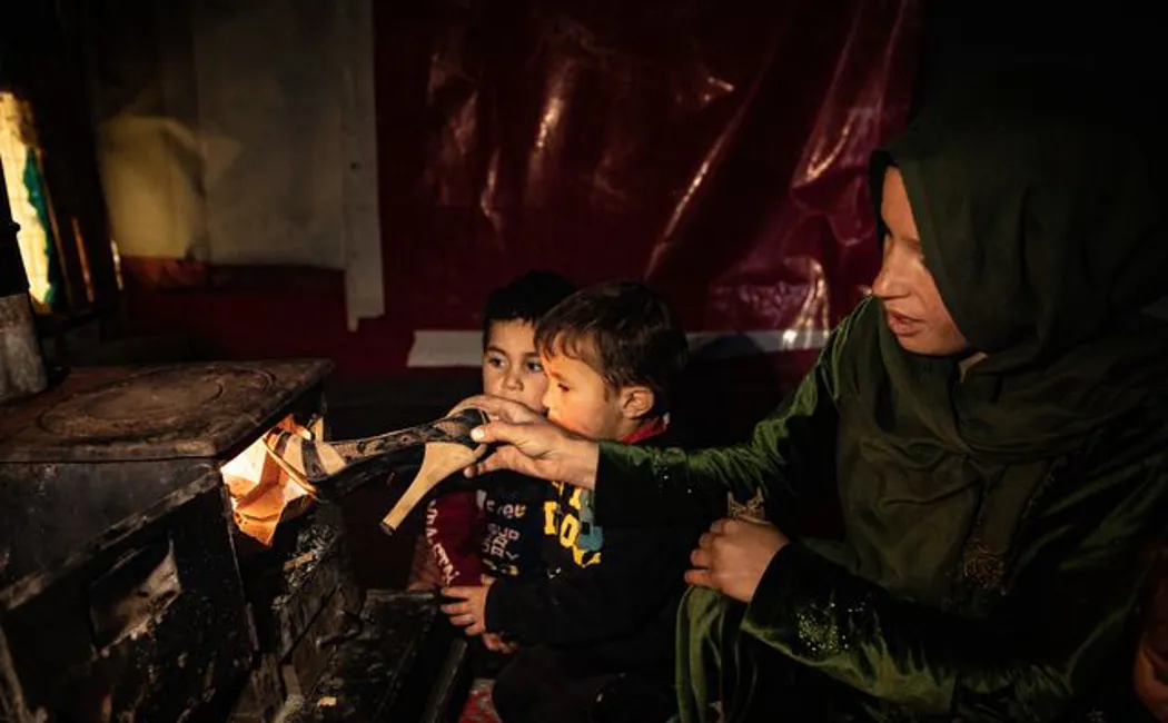 Lebanon_Refugees Are Forced To Use Plastic Shoes To Light Their Stove To Keep Warm