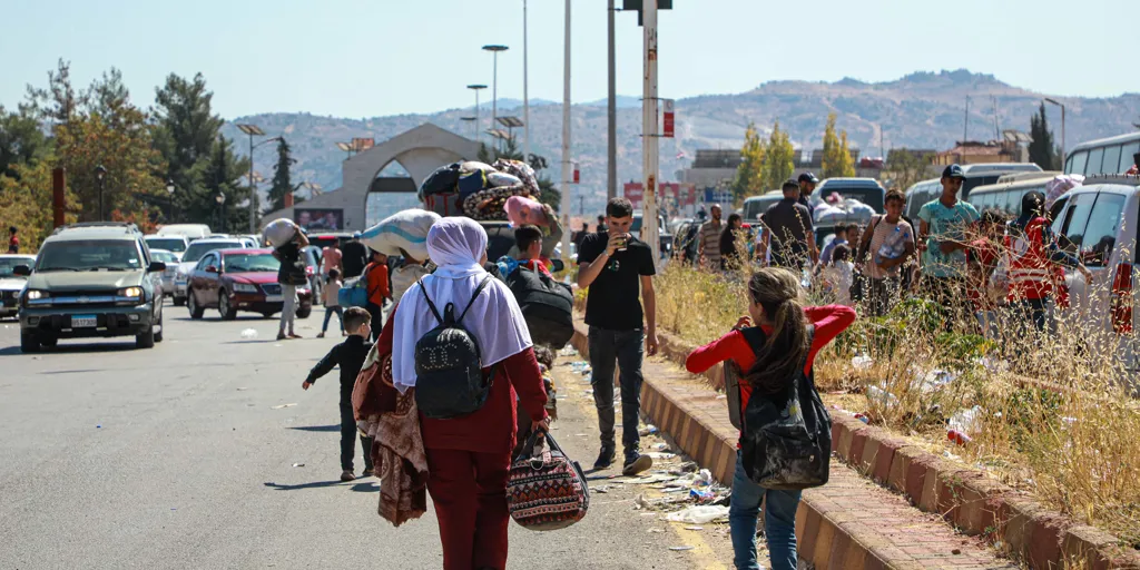 Thousands of people flee to Syria to escape deadly attacks.