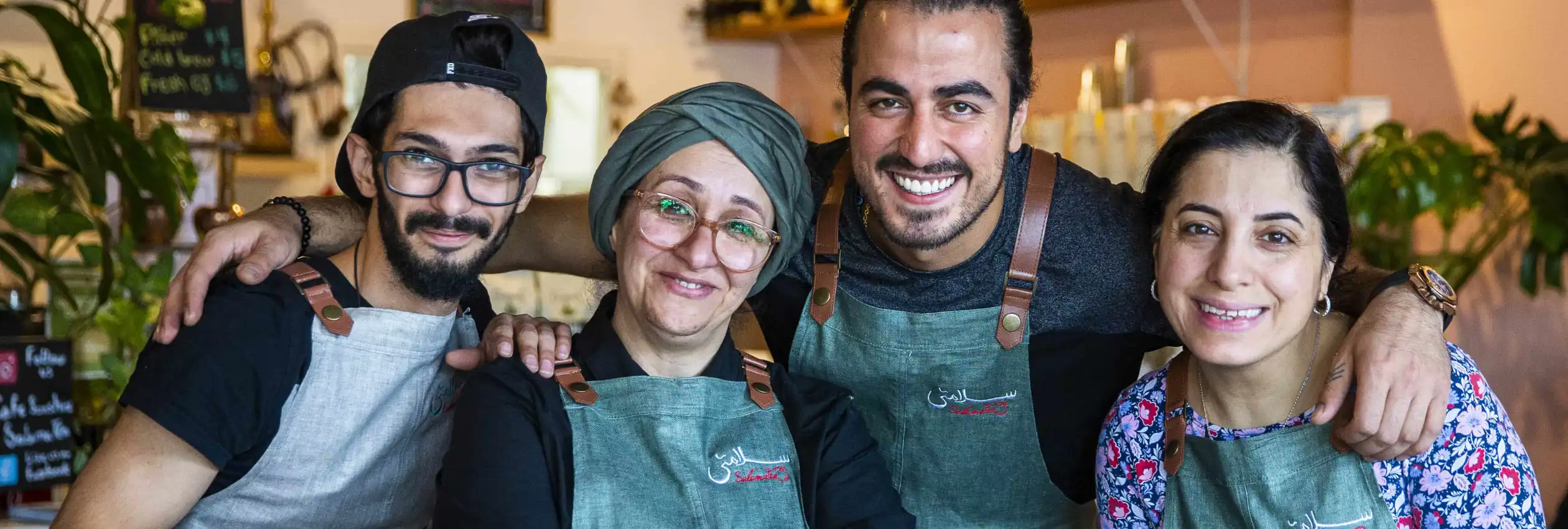 Australia. Hamed Allahyari and work colleagues at SalamaTea cafe