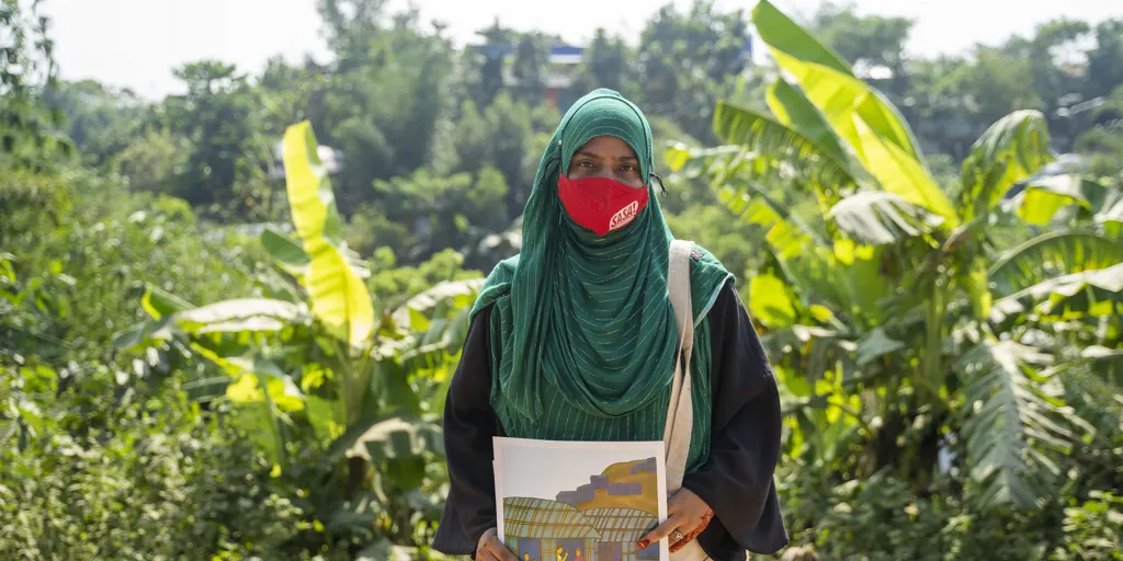 Rohingya refugee and community outreach volunteer Beauty Akther works with Rohingya women to raise awareness about gender-based violence in Kutupalong refugee camp in Cox’s Bazar, Bangladesh