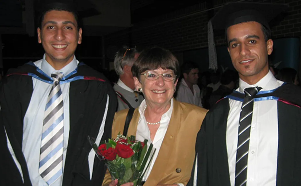 Dorothy Hoddinott With Two Refugee Students