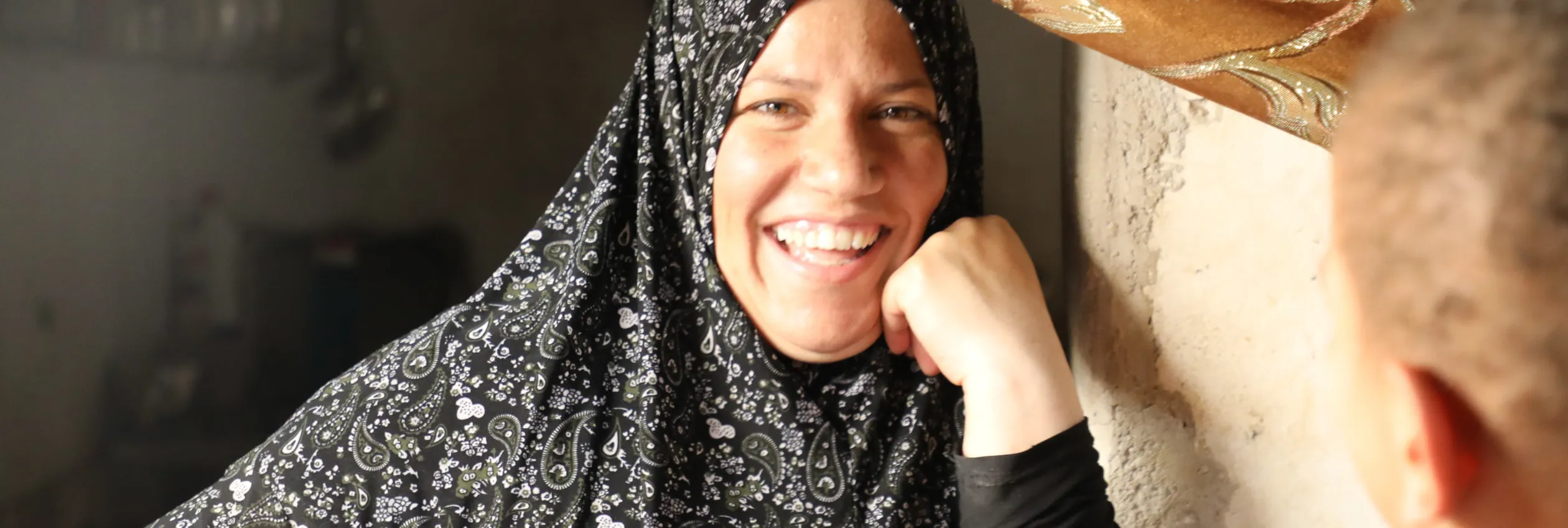 Zahra, a Syrian refugee with five children, is pictured at home in Mafraq.