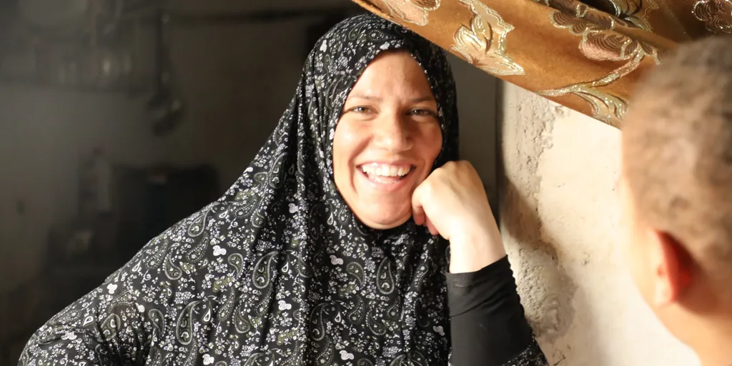 Zahra, a Syrian refugee with five children, is pictured at home in Mafraq