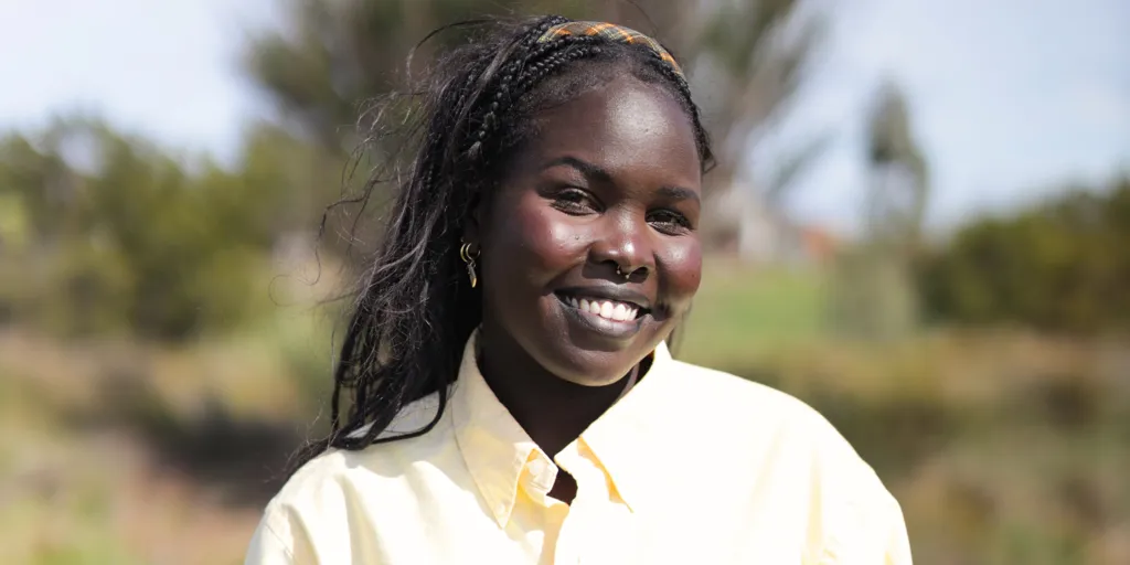 Kgshak Akec is a rising literary star, drawing from her own family's refugee background to craft powerful stories of survival and belonging.