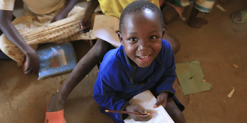 Facebook Education 06 Boy Writing